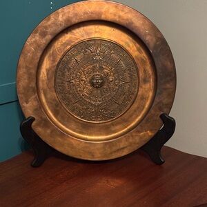 Vintage hand-hammered copper Aztec or Mayan calendar wall plaque or dish.